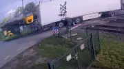 Shocking CCTV Captures Heart-Stopping Moment Train Smashes Into Lorry at Dutch Level Crossing