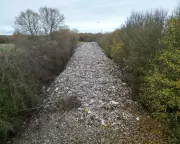 Fly-Tipping Scandal: Oxfordshire River Polluted by 150m Waste Mountain