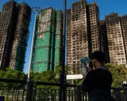 Hong Kong Apartment Fires Spark Public Outrage as Beijing Warns Disruptors