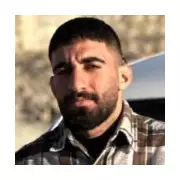 Iranian Protester Found Dead Amidst Flames of Khamenei Photo Protest