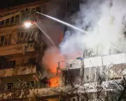 Kyiv Under Fire: Drone Strike Ignites Blaze as Trump's Peace Plan Fails