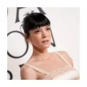 Lily Allen Stuns in Daring Red Carpet Gown as 'West End Girl' Stages Spectacular Chart Comeback