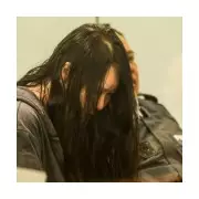 Mother jailed for life after hiding children's bodies in auctioned suitcase