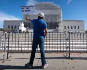 Trump's Second Term: A Whirlwind of Executive Action and Political Firestorms