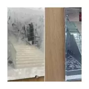 Volunteer Ruins Artwork by 'Cleaning' Dust-Covered Mirror