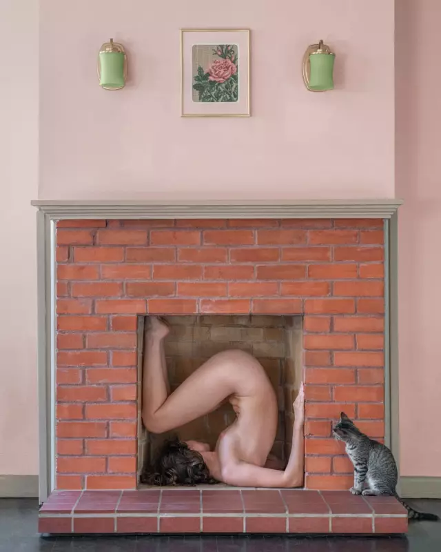 Brooke DiDonato's Best Photograph: Nude in a Fireplace with a Curious Kitten