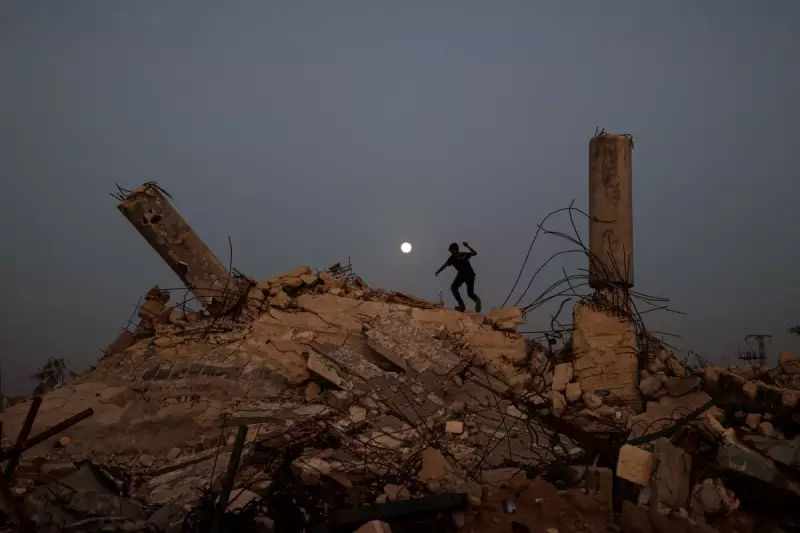 Cold Moon Over Gaza, Snow in Seoul: Friday's Global Photo Diary