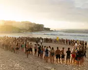 Bondi Beach Vigil: Swimmers Form Circle of Silence for Hanukkah Attack Victims