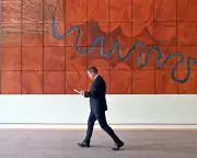 Chalmers' Mid-Year Budget: Deficit Narrows to £36.8bn Amid Inflation Woes