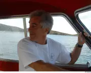 Epstein Files Release Sparks Political Storm Over Photo Removals and Redactions