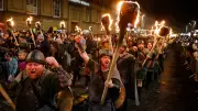 Global Lens: From Edinburgh's Torchlit Vikings to Gaza's Floods in Tuesday's Photos