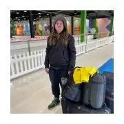 Homeless man sleeps in shopping centre doorway as Christmas shoppers pass by