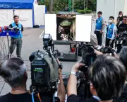 Hong Kong Fire Fallout: Beijing Summons Journalists Over 'Trouble-Making'