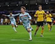 Lewis-Potter's Brace Sinks Wolves as Brentford Ease Relegation Fears