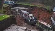 Whitchurch Canal Disaster: Dramatic Video Shows Narrowboat Plunging Into 50m Sinkhole