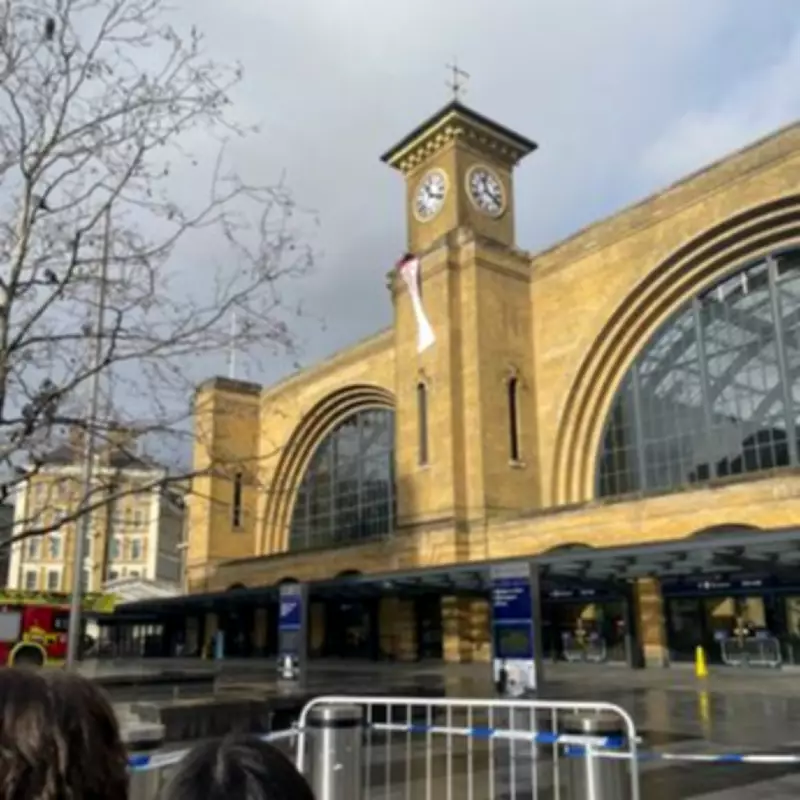 Protestor Climbs 120ft King's Cross Tower, Unfurling Iran Democracy Banner