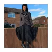 Artist's Garden Fence Tribute to Claudia Winkleman Captivates Suffolk Community