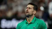 Djokovic Apologises After Near Miss with Ball Girl During Historic Australian Open Win