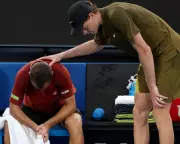 Jannik Sinner Triumphs as Gael Monfils Bids Emotional Farewell at Australian Open 2026