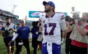 Josh Allen Battles Through Injury to Lead Bills to Dramatic Playoff Victory