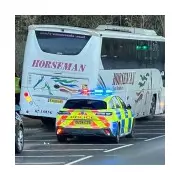 Nine Children Injured in Icy Reading Coach and Bus Crash