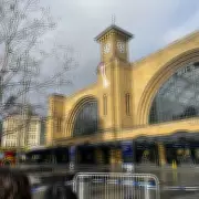 Protestor Climbs 120ft King's Cross Tower, Unfurling Iran Democracy Banner