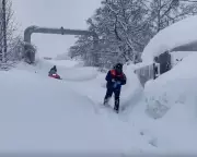 Record Snowfall Buries Russian Town as Storm Harry Floods Mediterranean