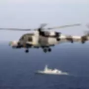 Royal Navy Wildcat Helicopter Intercepts Russian Ship Near UK Telecom Cables