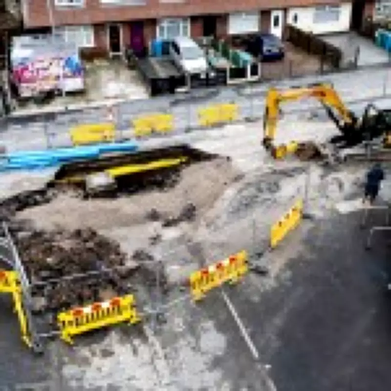 Massive 32-Foot Sinkhole Opens on Manchester Street Near Homes