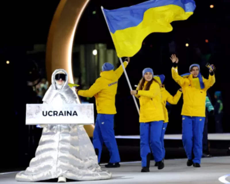Russian Volunteer Carries Ukraine Placard at Winter Olympics in Silent Protest