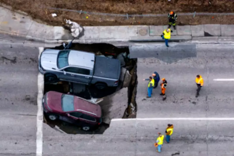 Sinkhole Swallows Two Vehicles in Omaha, Drivers Escape Unharmed