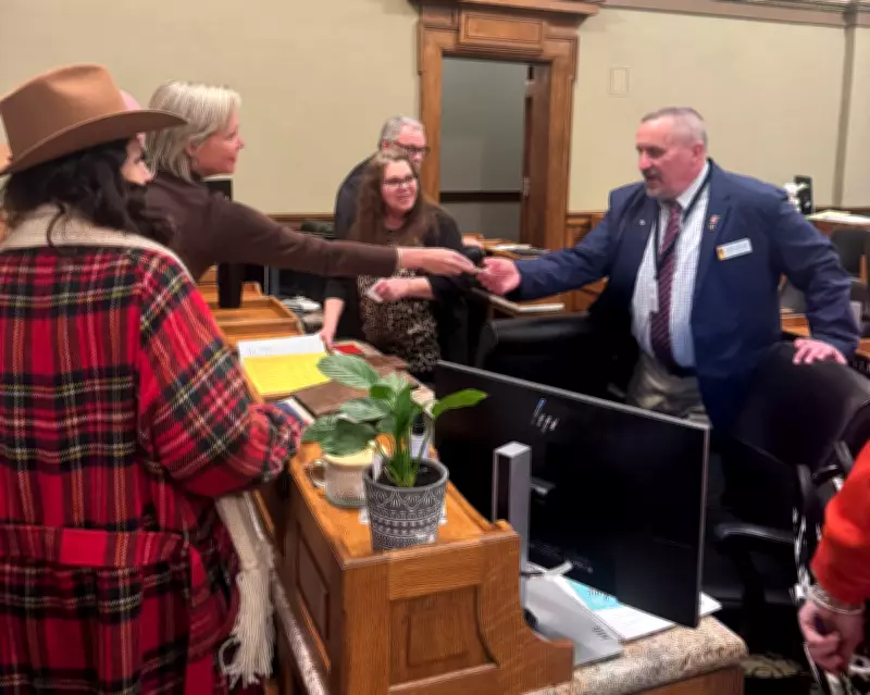 Wyoming Political Scandal: Far-Right Activist Hands Checks to Lawmakers on House Floor
