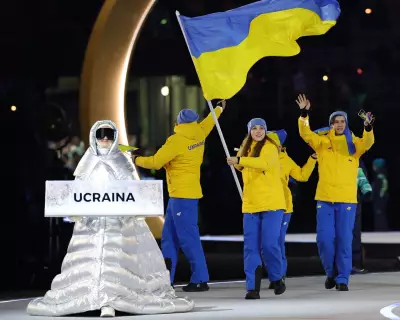 Russian Volunteer Carries Ukraine Placard at Winter Olympics in Silent Protest