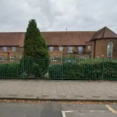 Two Boys Stabbed at London School: Teenage Suspect Identified and Fleeing