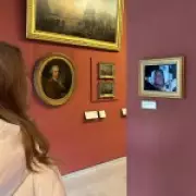 Activists Hang Prince Andrew's Arrest Photo in Louvre Museum as Protest