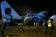 Bolivia Military Plane Crash Kills 15, Scatters Banknotes on Highway