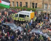 Glasgow's Day of Defiance: How Pyjama-Clad Neighbors Stood Against Immigration Raid