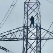 Man Climbs Power Pylon in Brighouse, Cutting Electricity to 20,000 Homes