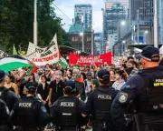 Sydney Protest Incident: Woman Sustains Four Broken Vertebrae Amid Police Action