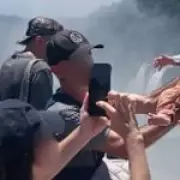 Tourist Risks Baby's Life for Photo at 260ft Iguazu Falls in Argentina
