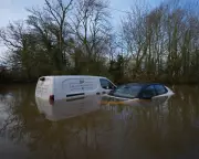 Vehicles Abandoned in Flooded Leicestershire Ford as UK Rain Persists