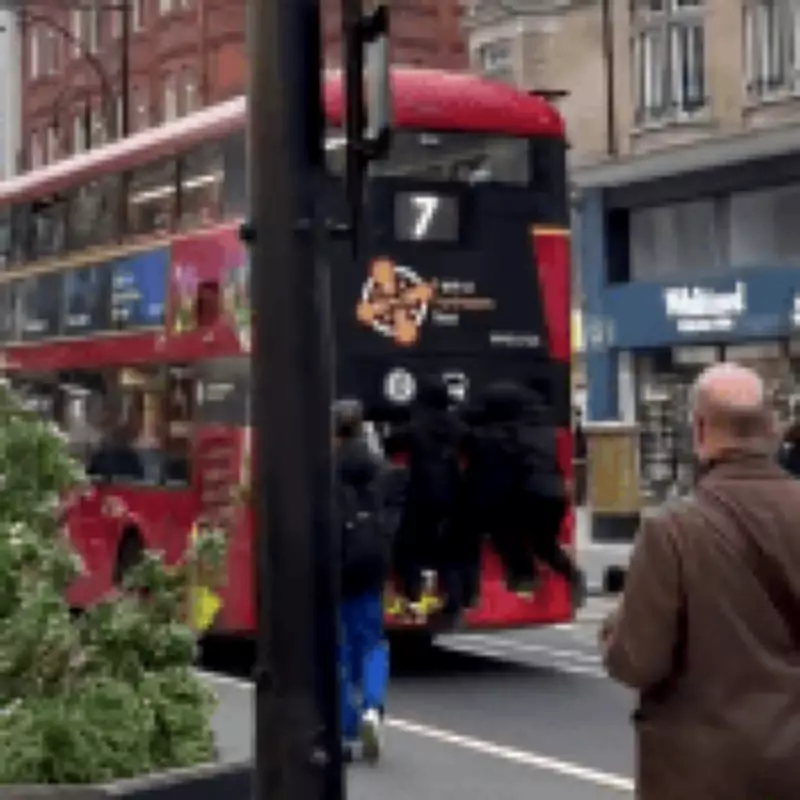 Teenagers Risk Lives Bus Surfing on Oxford Street in Dangerous Stunt