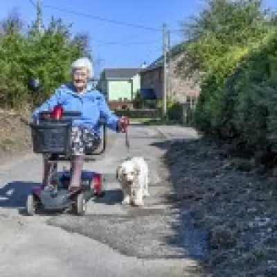 Elderly Woman Trapped Under Mobility Scooter After Hitting Deep Pothole
