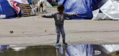 Global Snapshot: Humanoid Art, Eid Preparations, and Global Tensions Captured