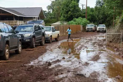 Hawaii's Worst Floods in 20 Years Leave Red Volcanic Mud Coating Homes