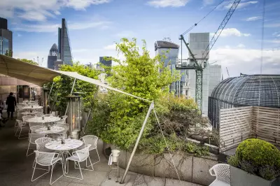Iconic City Restaurant Coq d'Argent to Relocate to New Rooftop in 2027