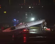 Air Canada Express Jet Collides with Fire Truck at LaGuardia, Killing Two Pilots