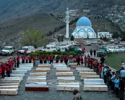 Families Search Unmarked Graves on Eid After Kabul Hospital Airstrike Kills Hundreds