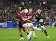 Global Weekend in Pictures: From Football Strikes to Green Rivers