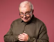 Harry Enfield's Comedy Legacy Shines in Nostalgic Barbican Show